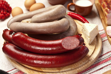 Home-made sausages on the cutting board.