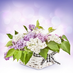 Lilac flowers in basket