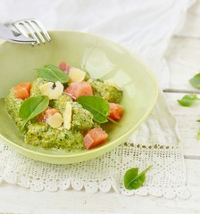 gnocchi with pesto sauce and smoked salmon