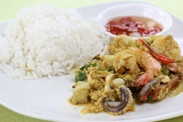 Seafood yellow curry powder stir Fried with steam rice