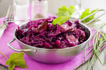 Braised red cabbage with sausages.