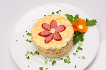 Fresh salad with mayonnaise, sausage, potatoes, pepper