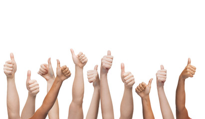 human hands showing thumbs up