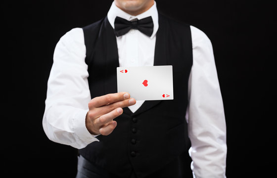 Dealer Holding White Card