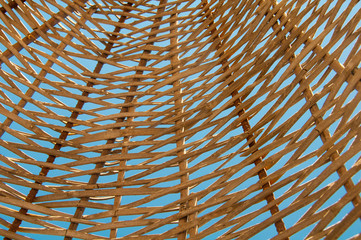 Background  rattan parasol of wicker