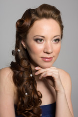 Naklejka premium Beautiful girl in a blue dress