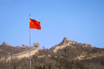 The Chinese Flag Before The Great Wall Of China