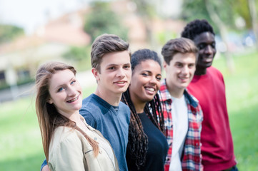 Multiethnic Group of Teenagers Walking at Park