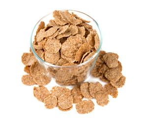 pile of bran flakes isolated on white