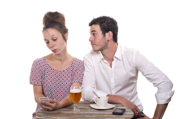 young couple with their phones are Disgruntled