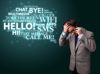 Young man making phone call with word cloud