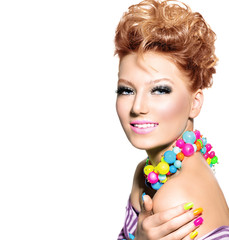 Beauty girl with colorful makeup, nail polish and accessories