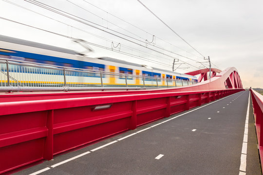 Train passing a bridge in Overijssel, The Netherlands