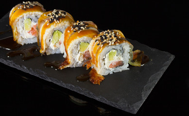 sushi over black background