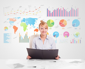 Business woman with colorful charts