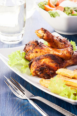 Chicken drumsticks with chips