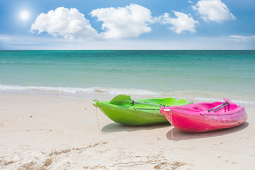 canoe on beach sea and sun light