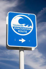 Tsunami flood evacuation route roadside sign