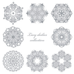 Lacy doilies set isolated on white.
