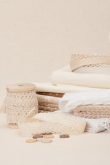Sewing And Embroidery Craft Kit. Natural Linen Background