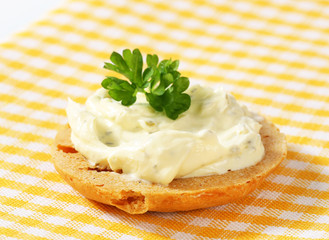 Cracker with cheese spread