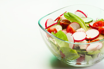 Fresh vegetable salad with cucumber and radish