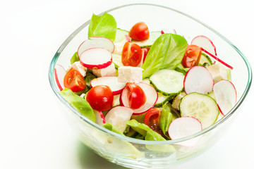 Fresh vegetable salad with cucumber and radish
