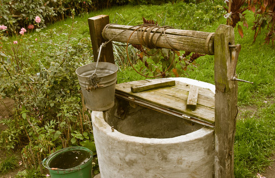 old rotten water well, rural scenery