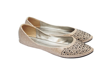 beige flat lady's shoes with black plastic jewelry