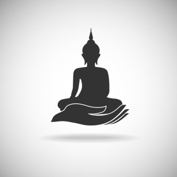 Buddha image on hand silhouette