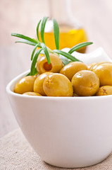 Naklejka na ściany i meble Green olives in a bowl