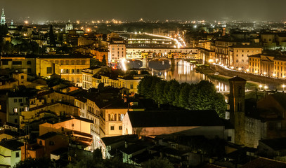 Fototapeta na wymiar Ponte Vecchio night view over Arno river, Florence