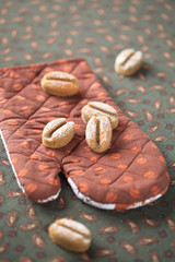 Coffee Madeleines on a brown pot holder