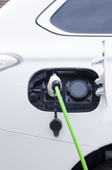 Electric white car charging battery