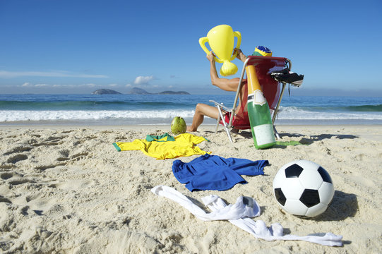 Champion Brazilian Football Player Celebrating in Beach Chair