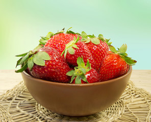 Strawberry in a bowl closeup.