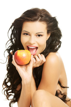 Fototapeta Szczęśliwa naga kobieta z jabłkiem
