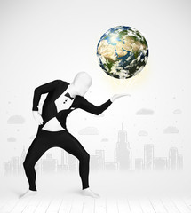 man in full body suit holding planet earth