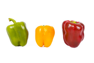 red green and yellow pepper isolated on white