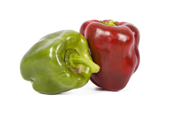 Natural red and green peppers isolated on white background