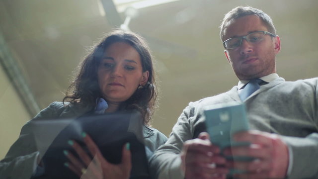 Businesspeople working on modern technology in the office, stead