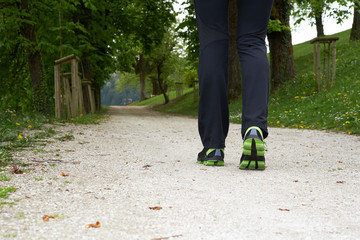 Two legs walking in spring park