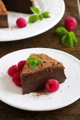 Truffle chocolate cake with raspberries.