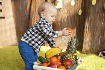 Fototapeta premium Baby and fruits