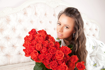 Beauty fashion model girl portrait with red roses
