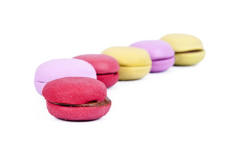 Obraz na płótnie Canvas macarons stacked up isolated on white background