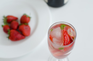Strawberries in glass with mint