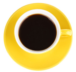 Yellow cup and saucer isolated on white