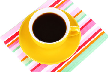 Yellow cup and saucer isolated on white