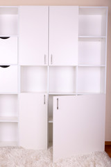 Empty white shelves close up